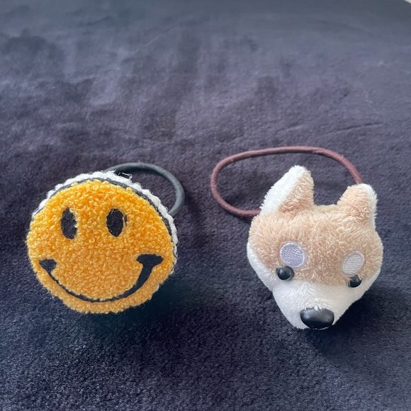 Two Cute hair ties from Japan- (dog/ only used once)(smile / never used) - Picture 1 of 4